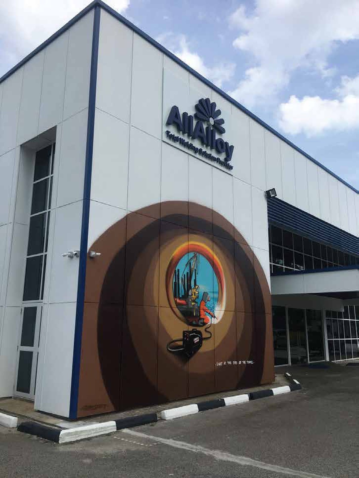 Allalloy · Tuas &mdash; facade signage & mural