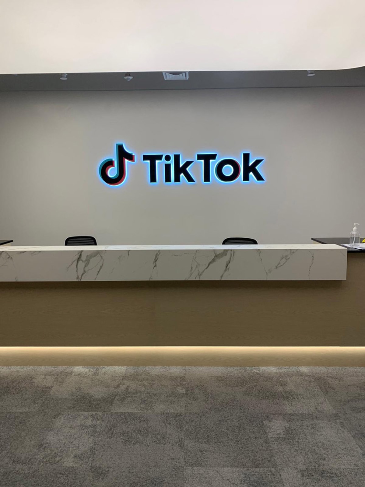 TikTok backlit reception lettering installed by Elixir Signs