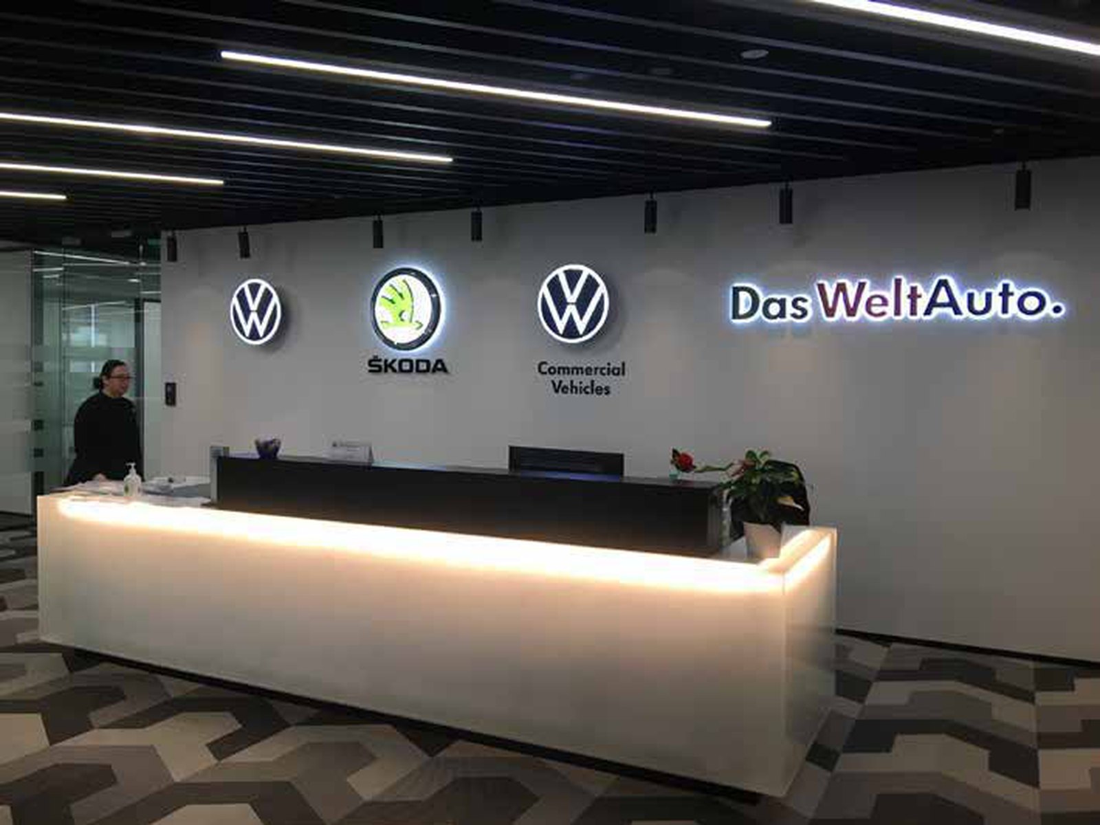 Volkswagen · Alexandra Road &mdash; backlit logo wall · showroom
