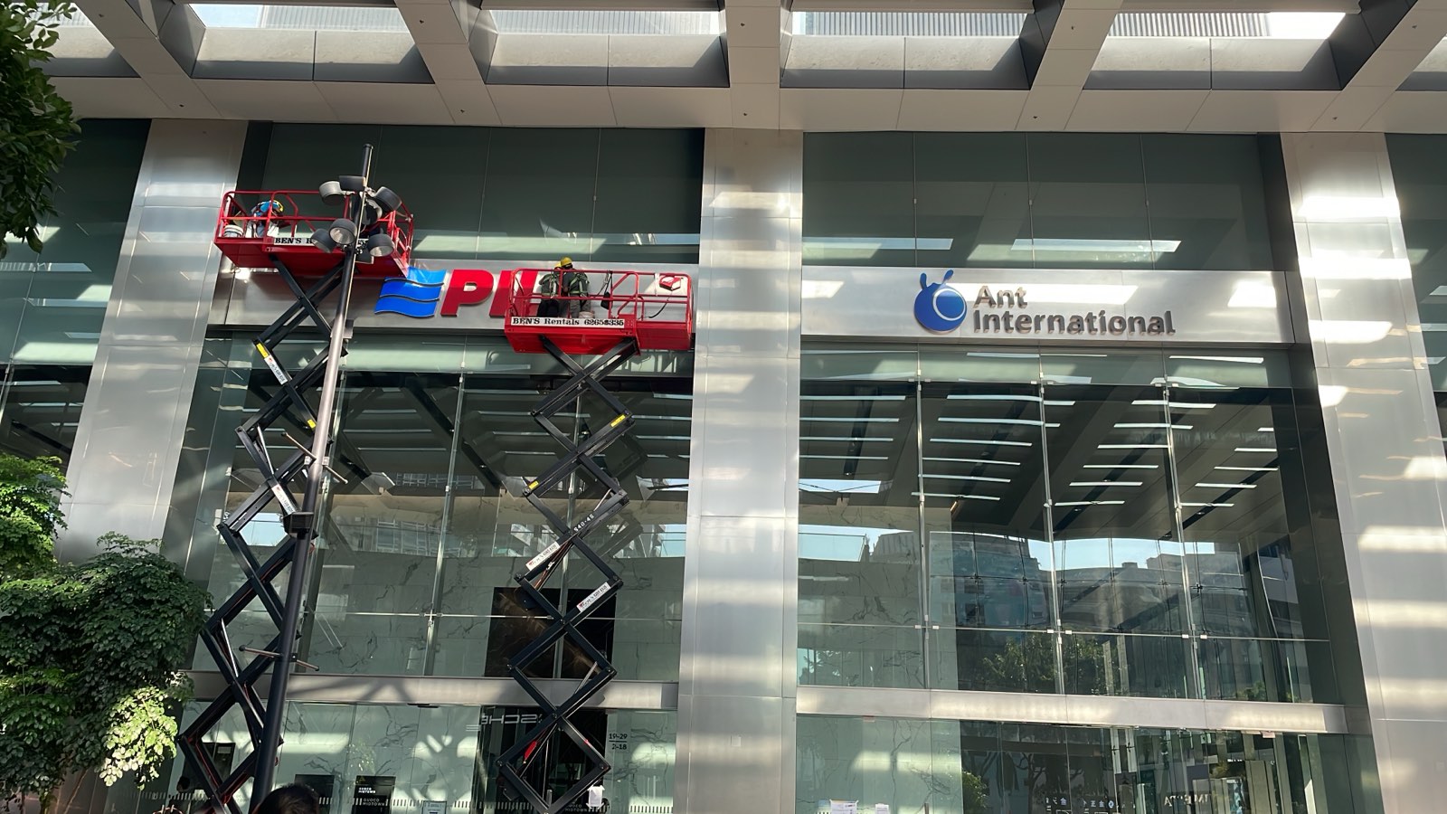 Storefront signage &mdash; glass-front fascia